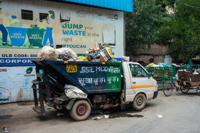 AI technology waste management disposal truck - Load-N-Lift dumpster rental Ontario